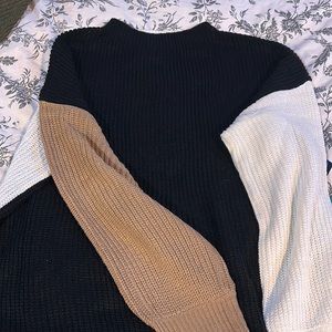 black, white, & brown sweater